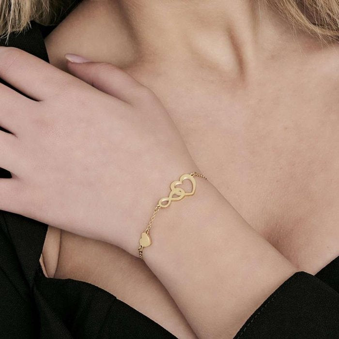 Bracciale in acciaio ip gold con cuori ed infinito
