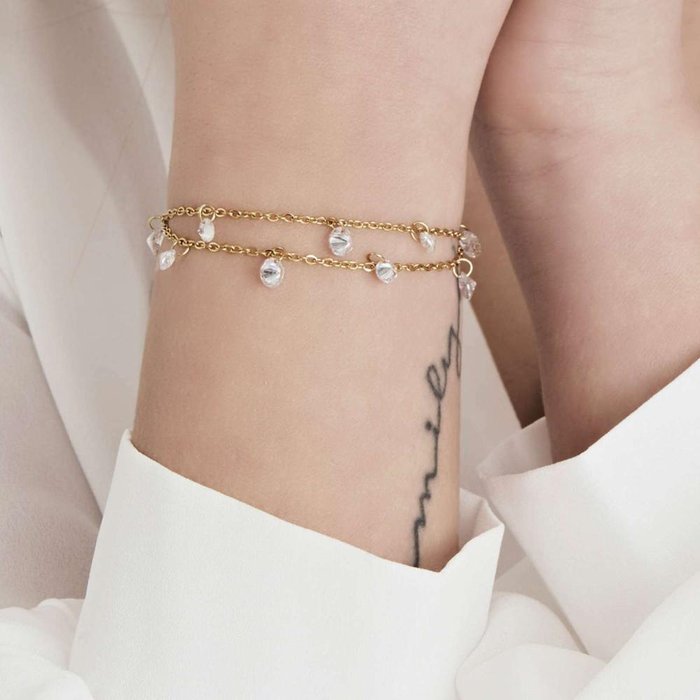 Bracciale in acciaio ip gold con cristalli bianchi