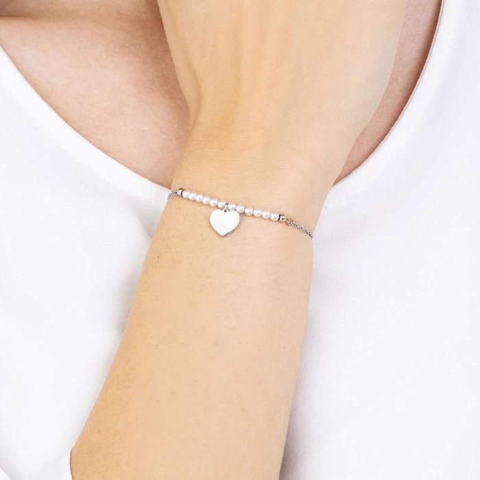 Bracciale in acciaio con cuore e perle bianche