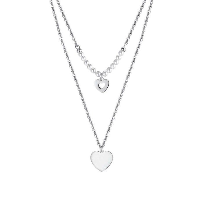 Collana in acciaio con cuori e perle bianche