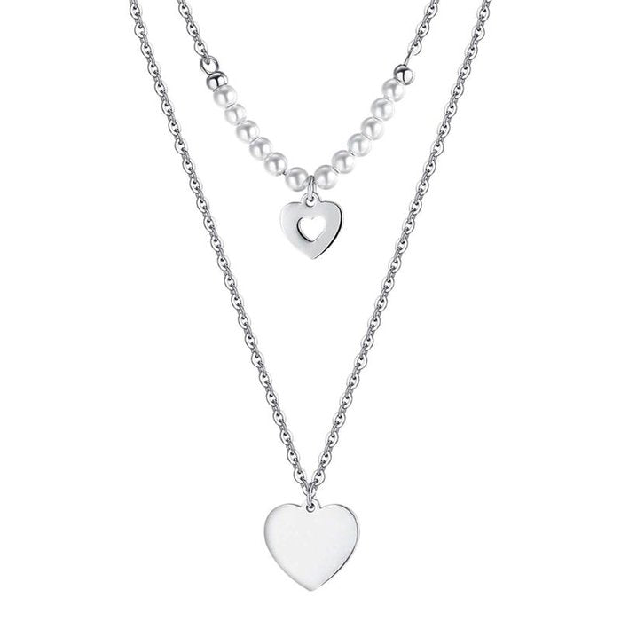 Collana in acciaio con cuori e perle bianche