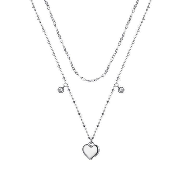 Collana in acciaio con cuore e cristalli bianchi