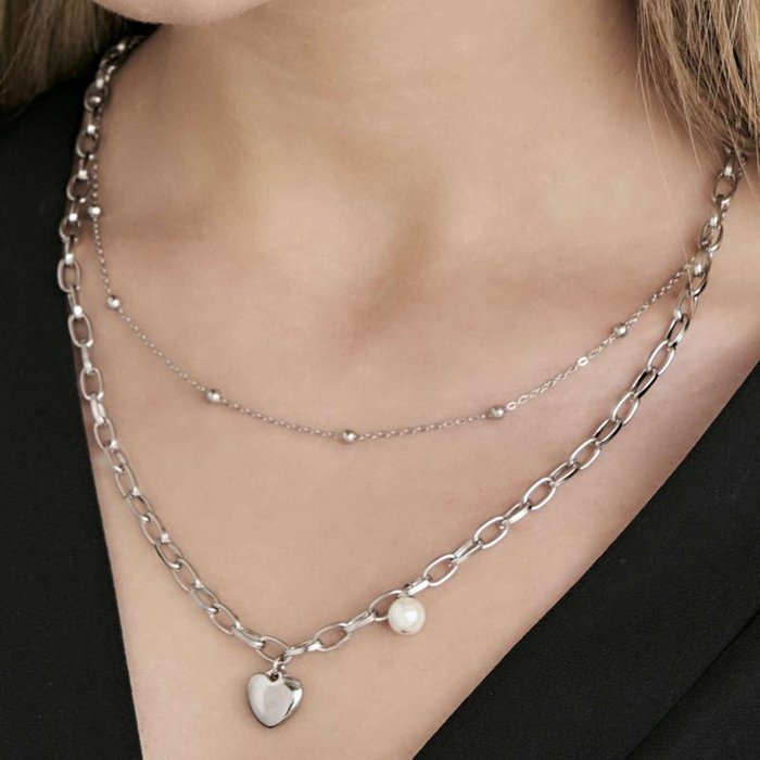 Collana in acciaio con cuore e perla