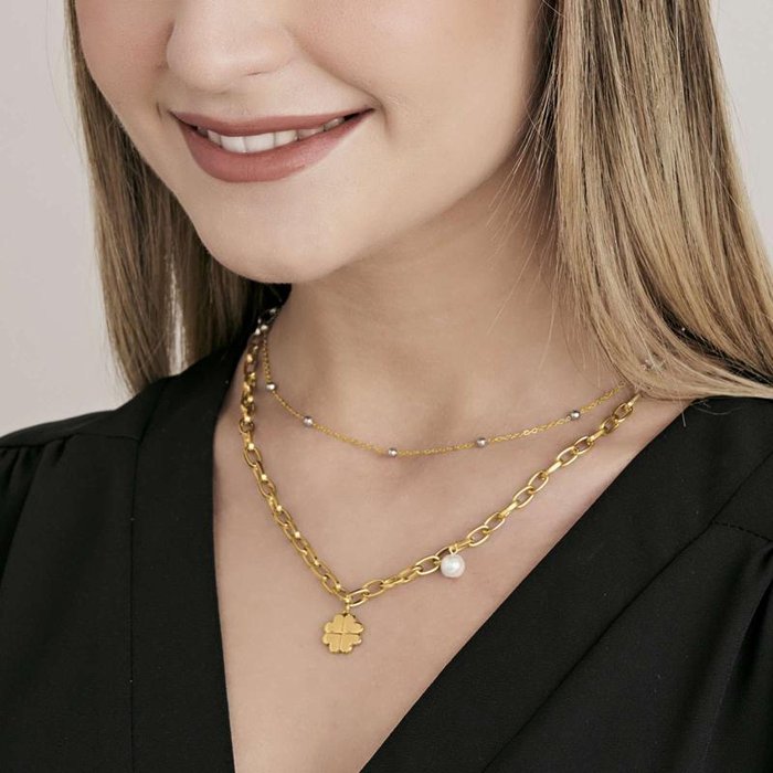 Collana in acciaio ip gold con quadrifoglio e perla