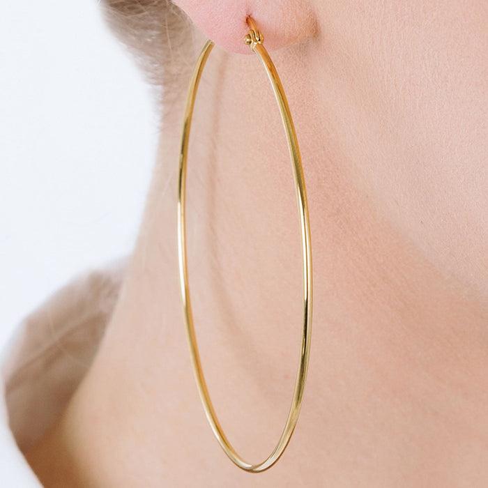 BOUCLES D'OREILLES CRÉOLES FEMME EN ACIER DIAMÈTRE 63 MM