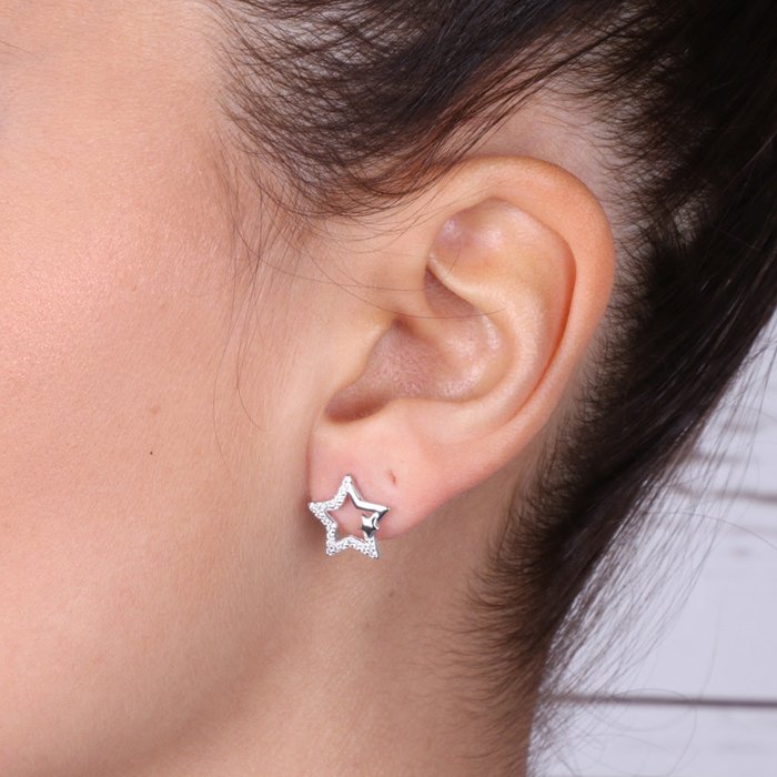 Boucles d'oreilles en argent 925 en forme d'étoile recouvertes de zircons blancs