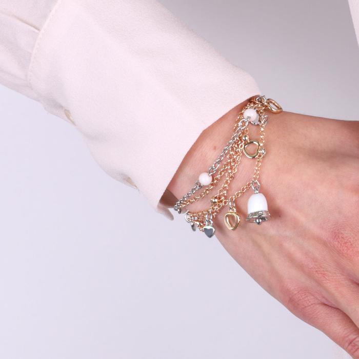 Metal bracelet with heart-shaped charms and white enamel bell